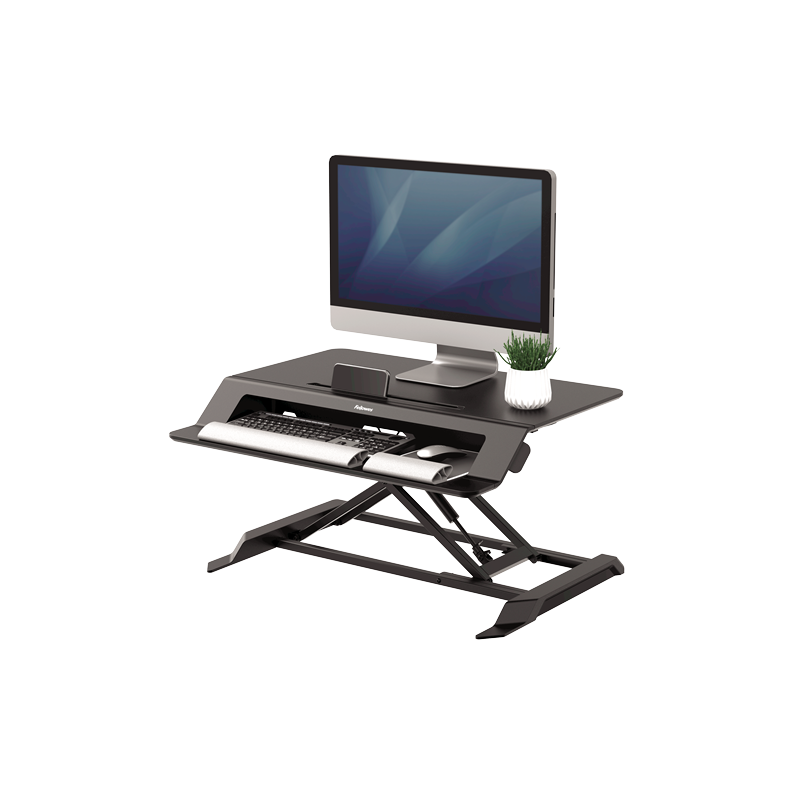 Estación de trabajo sit stand Lotus LT Fellowes para alternar trabajo sentado y de pie.